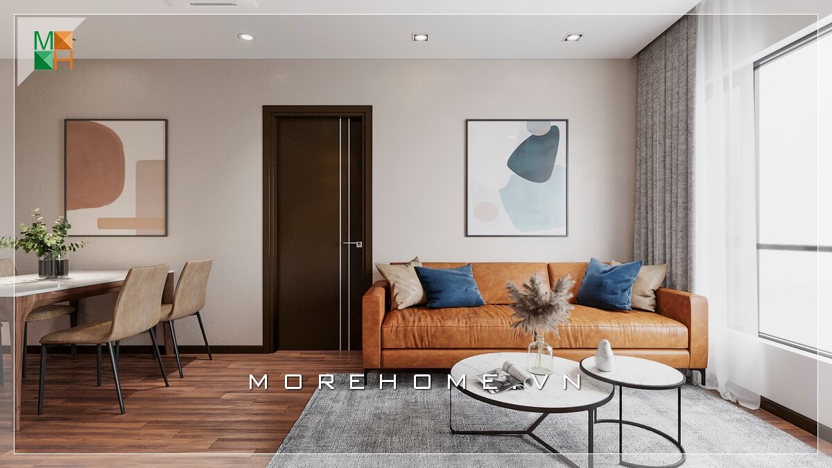 Giới thiệu mẫu ghế sofa bọc da bò nổi bật phù hợp với không gian phòng khách chung cư đơn giản, kết hợp mẫu bàn độc đáo 2 mặt tròn chồng lên nhau khiến căn phòng khách trở nên hiện đại và sang trọng hơn. Thiết kế nội thất phòng khách chung cư